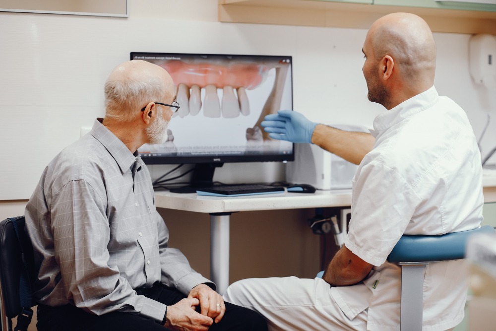 quanto costa rifare tutti i denti con gli impianti